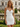 V-Neck Pleated Lace Up Mini Sheath Prom Dress in White