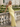 Backless V-Neck Lace Up Ruffle Sheath Long Prom Dress in Yellow