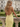 Backless V-Neck Lace Up Ruffle Sheath Long Prom Dress in Yellow