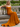 Scoop Neck Backless Lace Up Long Mermaid Prom Dress in Burnt Orange