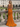 V-Neck Ruched Lace Up Long Mermaid Prom Dress in Burnt Orange
