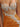 Sparkly Crystal Bodice Illusion Sheer Mini Sheath Homecoming Dress in Orange