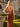 Luxury Crystal Strapless Ruched Hand Beading Bodice Long Mermaid Prom Dress With Slit in Burnt Orange