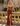 Luxury Crystal Strapless Ruched Hand Beading Bodice Long Mermaid Prom Dress With Slit in Burnt Orange